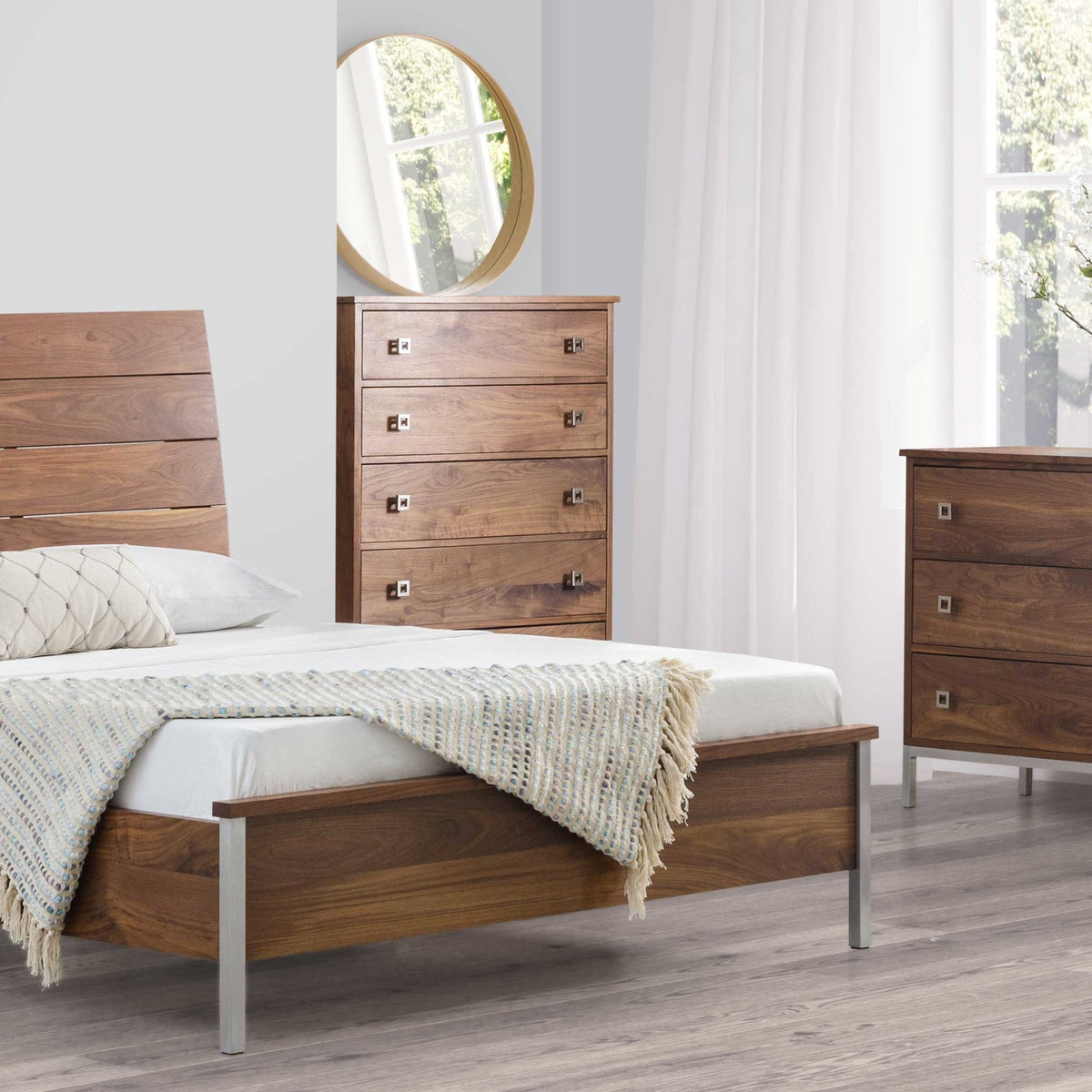 Walnut bedroom with a slat headboard panel bed, five drawer chest of drawers and matching dresser on steel legs