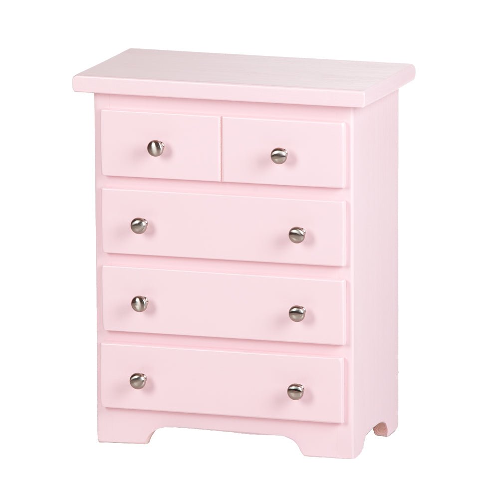 Soft pink doll chest of drawers with five drawers, silver round knobs and a curved cutout base on a white background