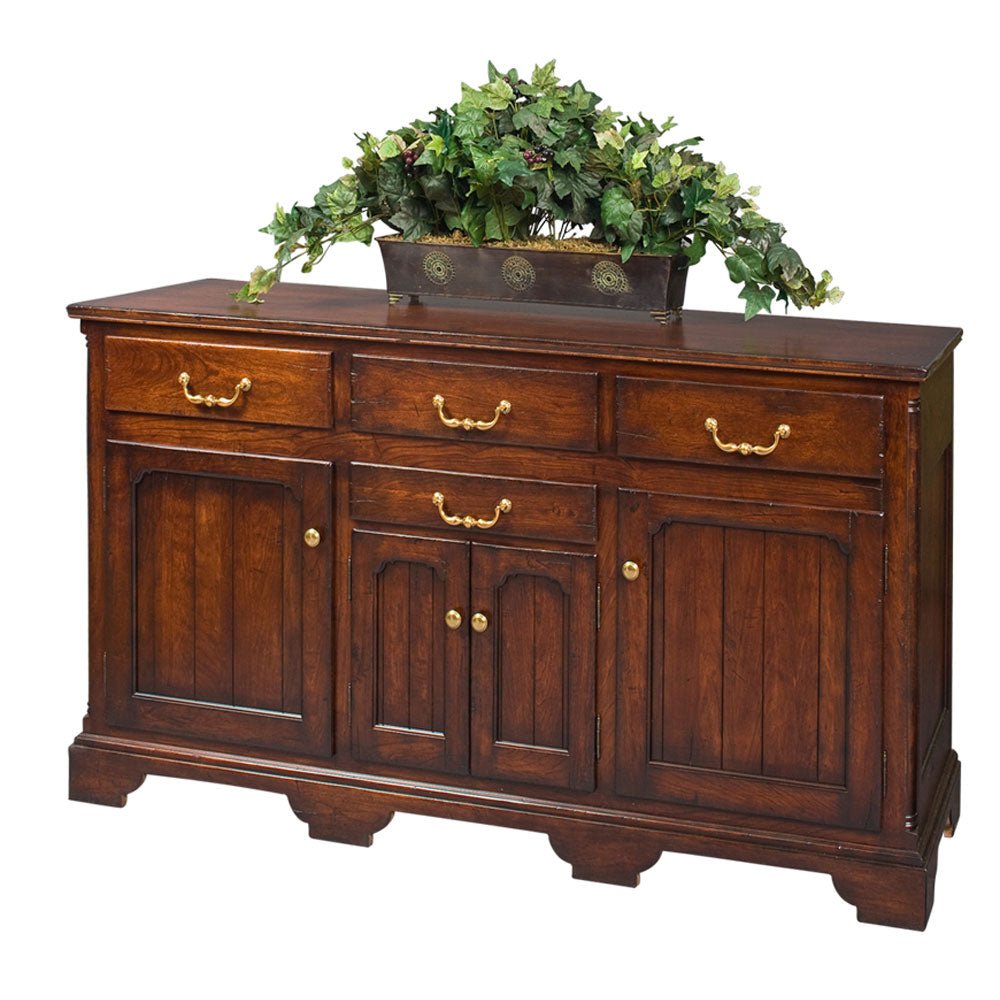 Oak Provence storage buffet with four drawers, three paneled doors, brass bail pulls and a bracket base