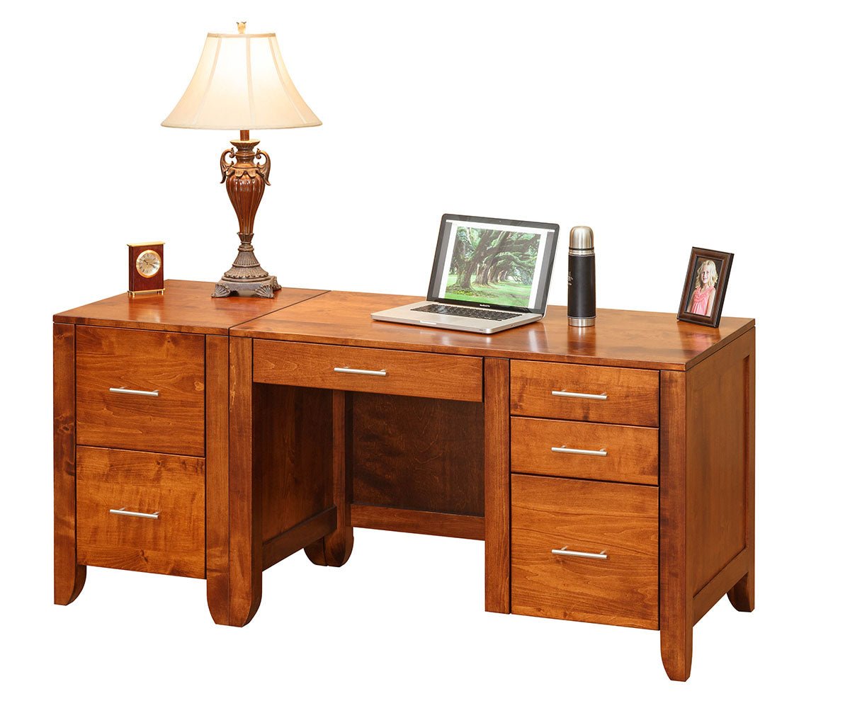Cherry desk with matching two drawer file cabinet, brushed bar pulls and a laptop and lamp staged on the tops