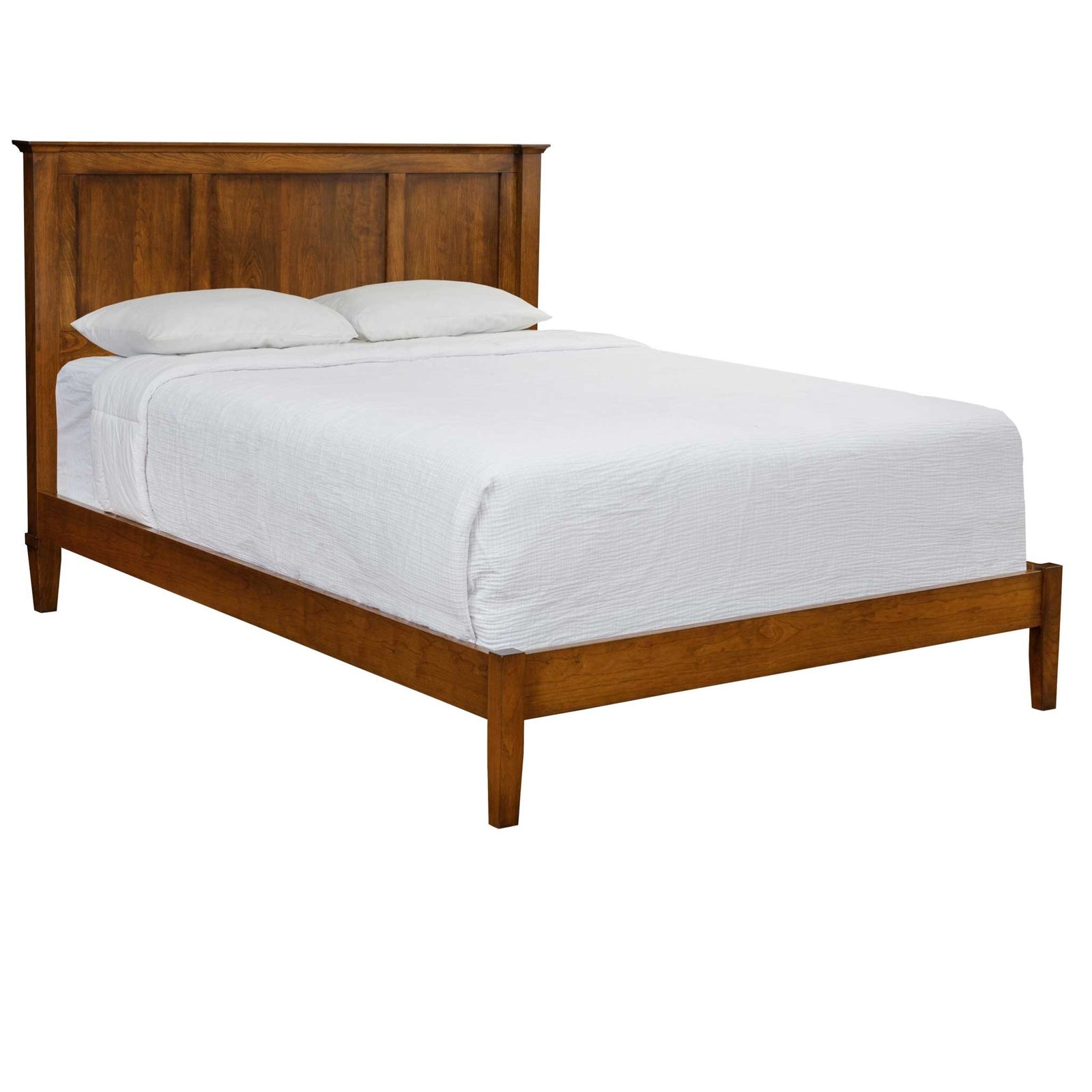 Bedroom with wooden bed, nightstand, and lamp in a home setting