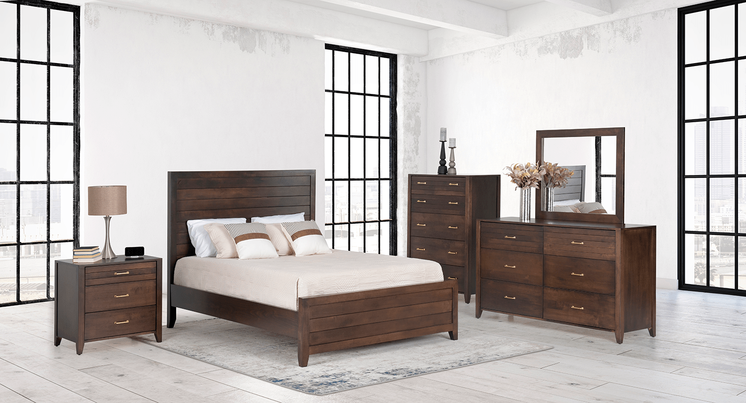 Queen panel bed with a tall shiplap plank headboard in dark brown wood, striped pillows and cream quilted bedding