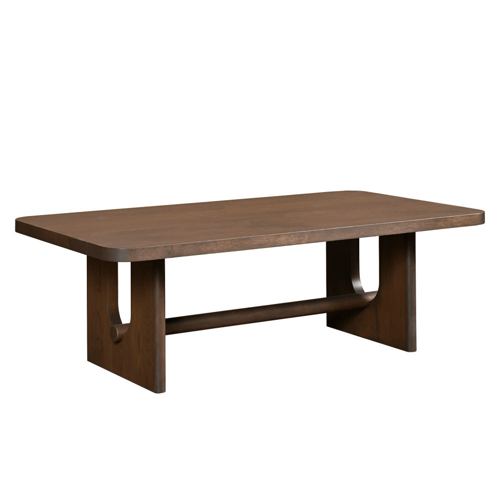 Rectangular walnut coffee table with rounded corners, curved slab panel legs and a round center stretcher