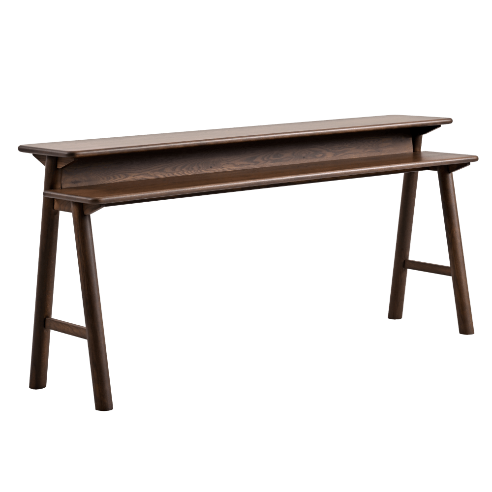 Narrow sofa bar table in walnut with a raised top shelf and three saddle seat stools tucked underneath by a fireplace