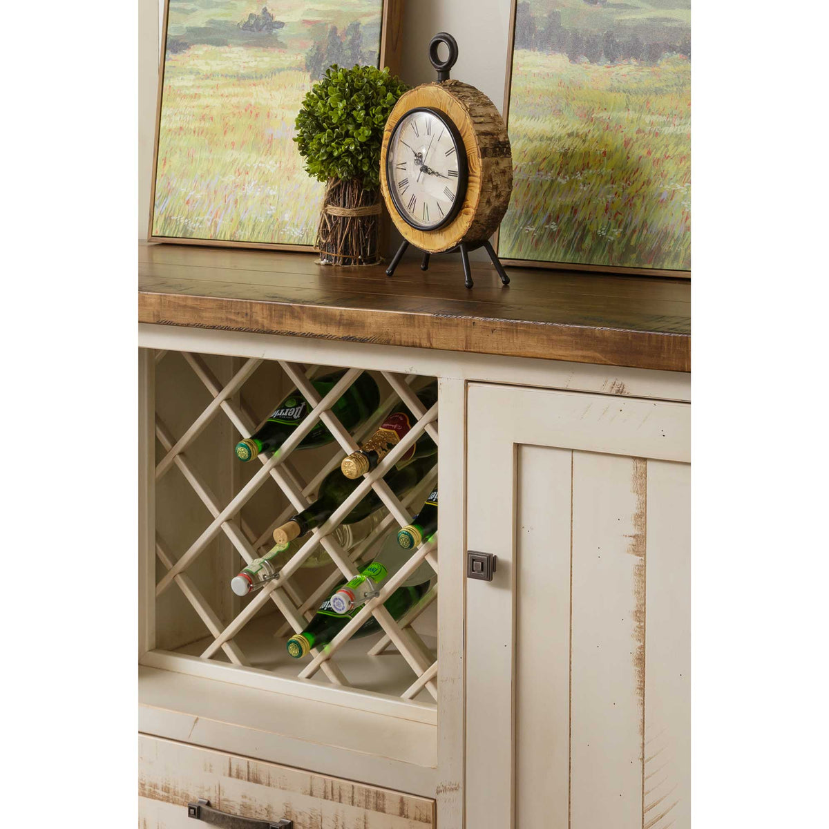 Close-up of the buffet's lattice wine rack holding bottles beneath a rough sawn brown plank top