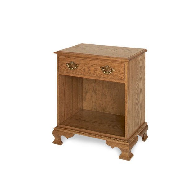 Open nightstand in oak with a single drawer, brass Chippendale pulls, open shelf cubby and ogee bracket feet