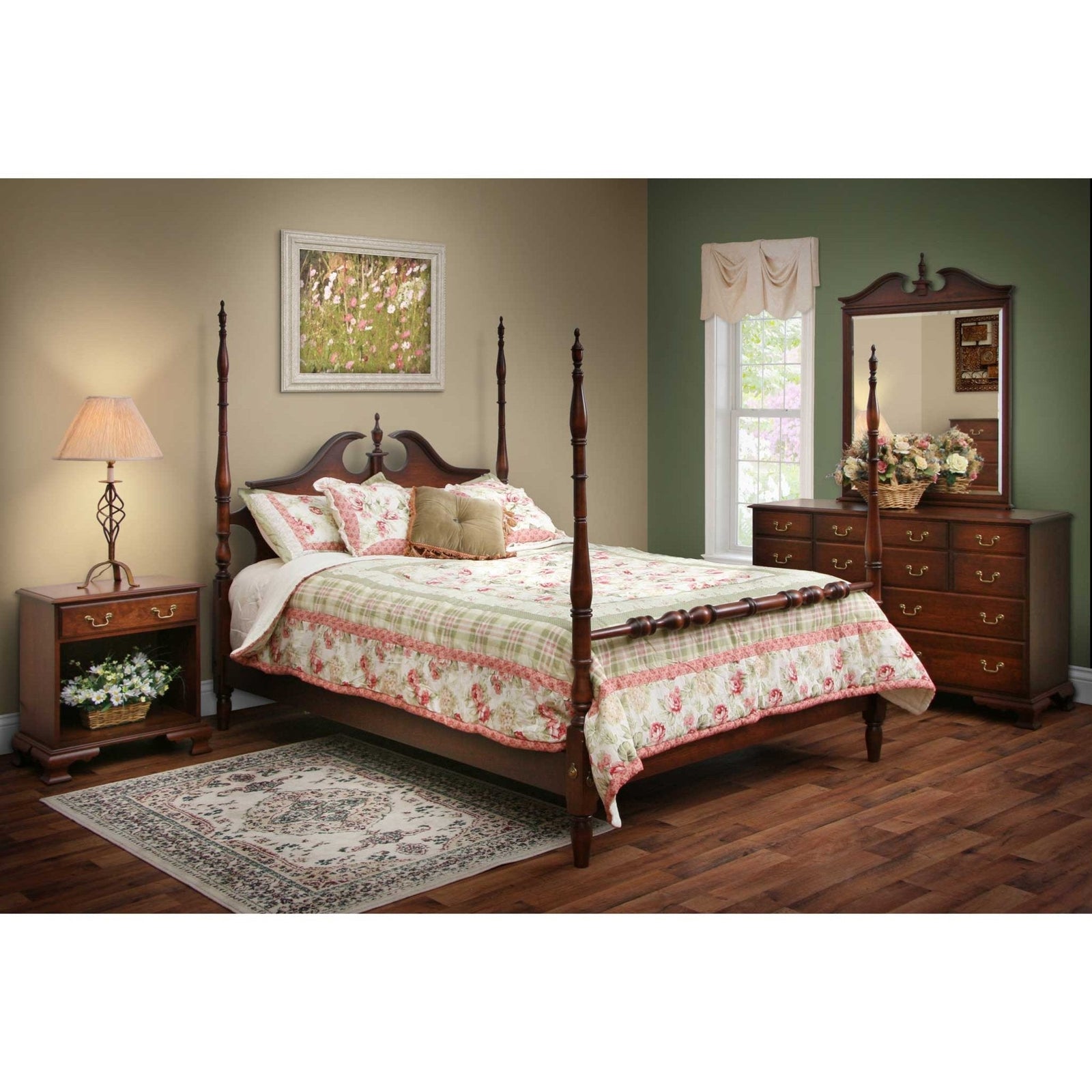 Cherry poster bedroom set with an arched pediment bed, floral quilt, nightstand and dresser with pediment mirror