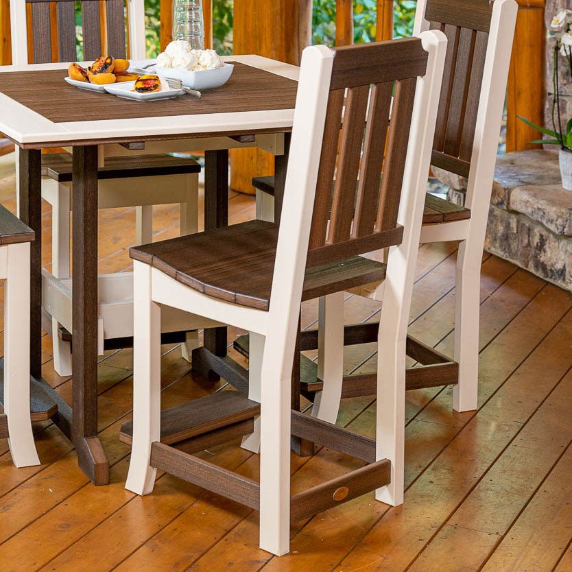 Brown and white poly counter height chairs with slat backs at a matching pub table on a porch