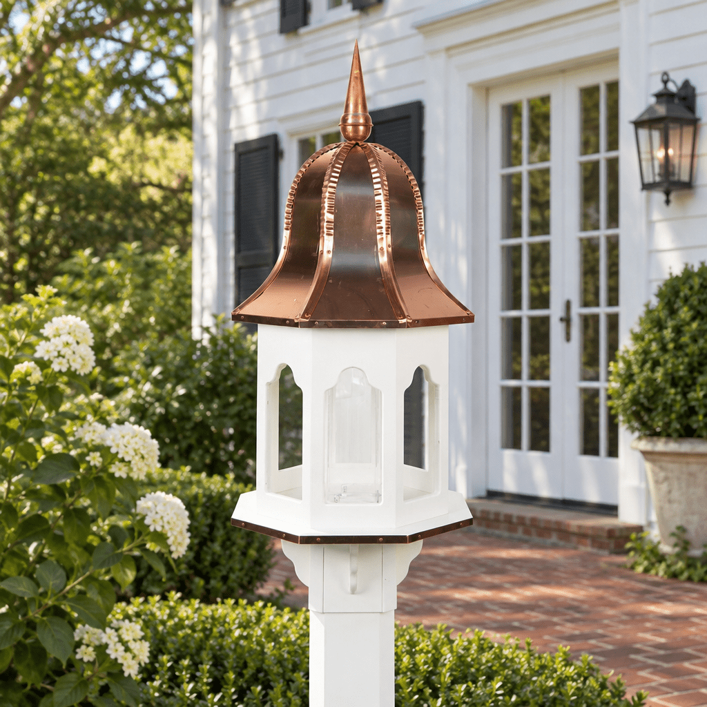 Amish Large Poly birdfeeder (copper top) shown in the back patio of a traditional colonial home