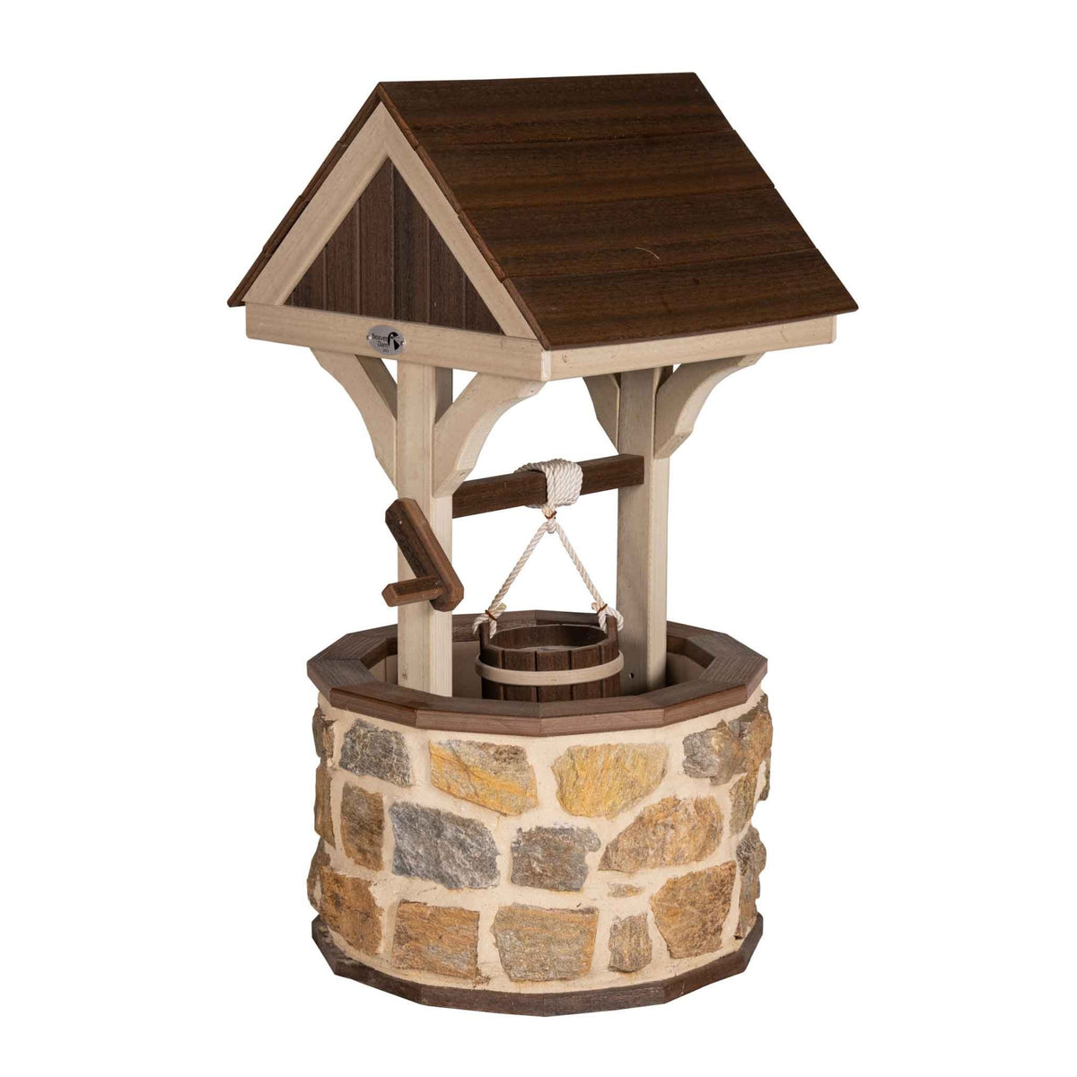 Stone wishing well with a brown gabled roof, tan trim, rope-hung wooden bucket and crank arm on a white background