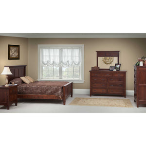 Cherry bedroom set in a tan bedroom: panel bed, nightstand, nine-drawer dresser with mirror and tall chest of drawers