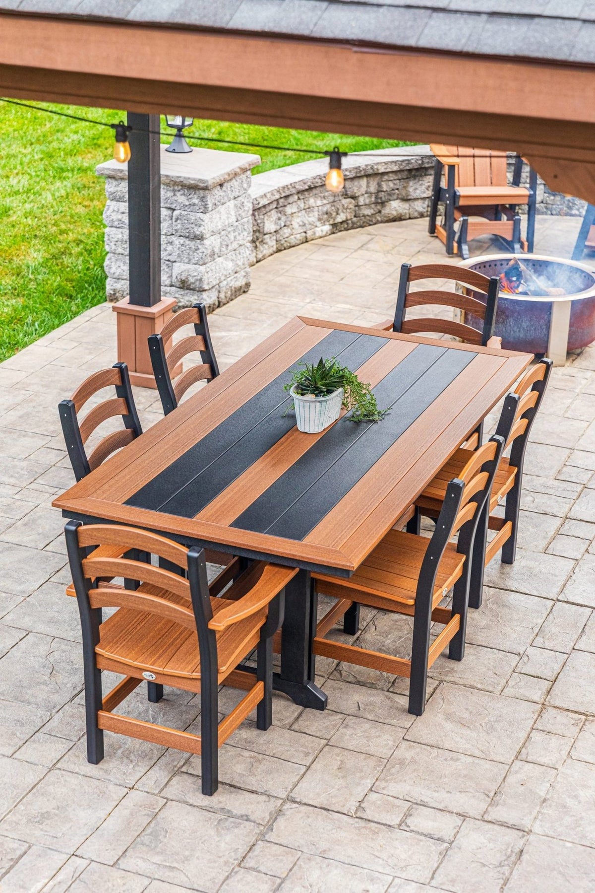 Long Beach 43 x 84 inch poly dining table with two arm chairs and side chairs, mahogany and black (photo 7)
