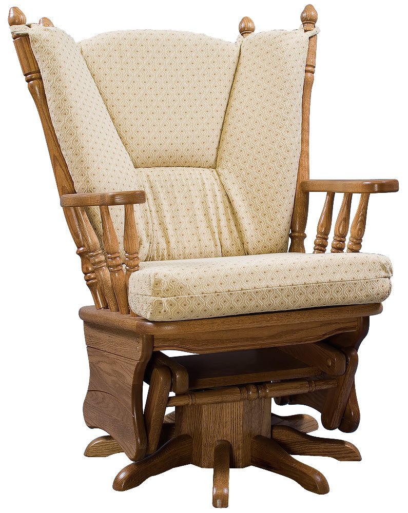 Low wing back swivel glider rocker in oak with cream patterned cushions, spindle arms and gliding pedestal base