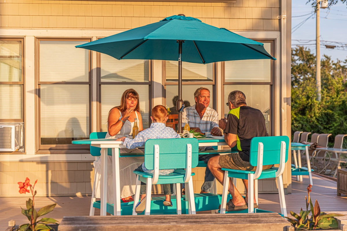 Maui poly 8' surfboard bar table with six bar chairs, white & aruba blue, family dinner on deck