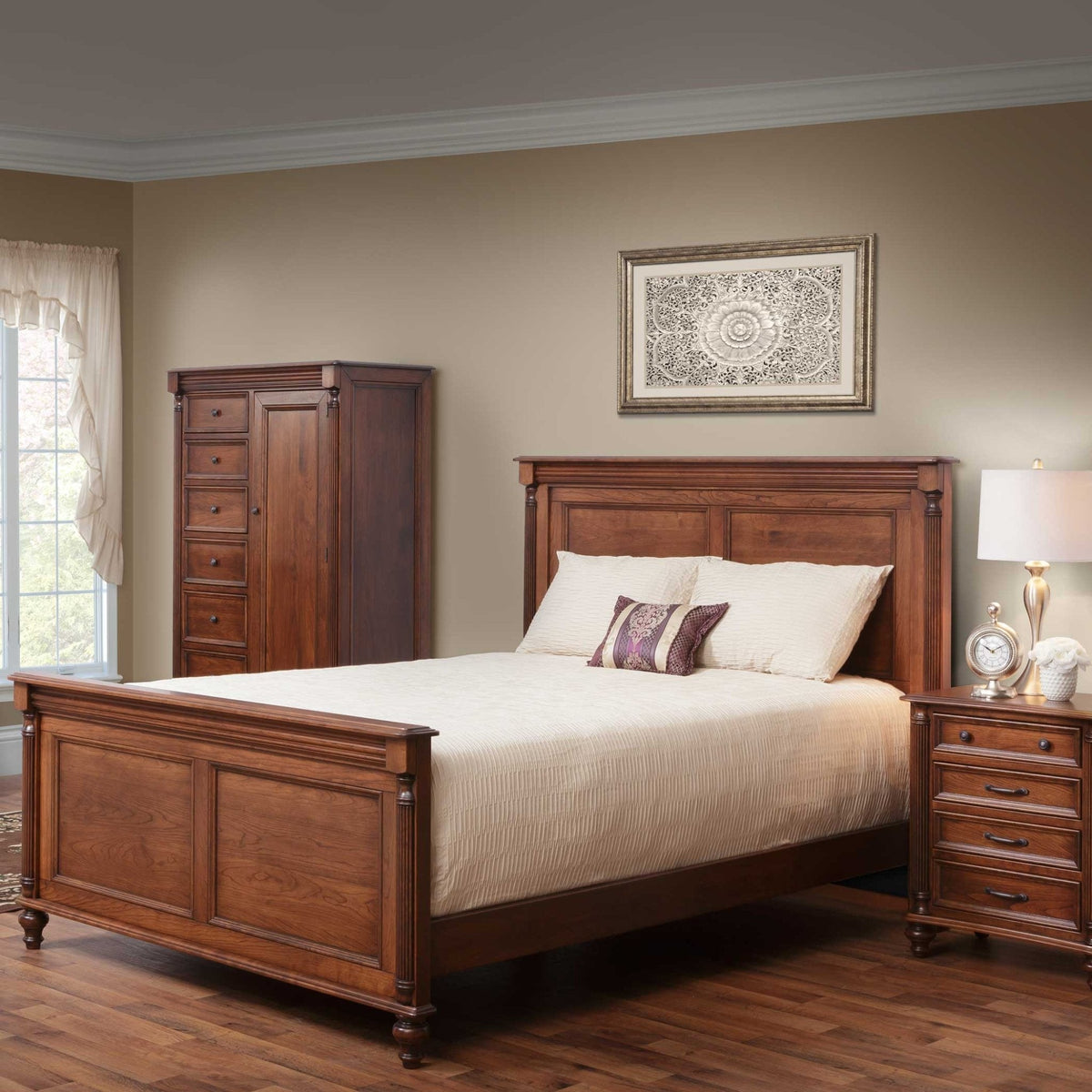 Cherry Milano panel bed with tall gentleman's chest and nightstand in a warm styled bedroom with framed wall art
