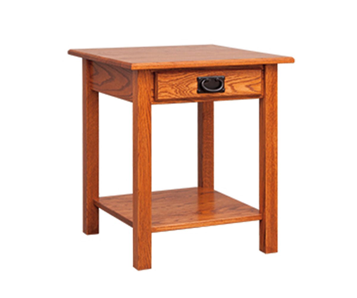 Oak Mission end table with a single drawer, black bail pull, lower shelf and square legs on a white background