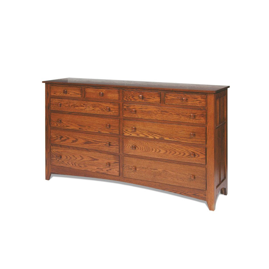 Ten-drawer Mission oak triple dresser with round wood knobs, paneled sides and a gently arched apron