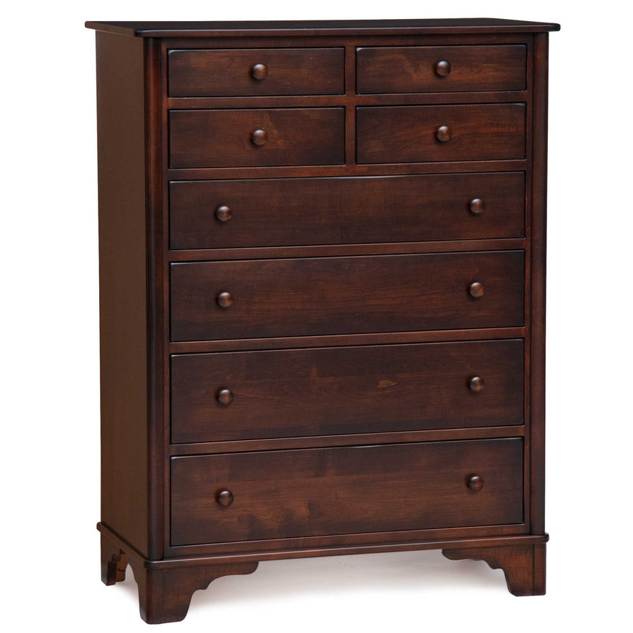 Dark cherry eight-drawer chest with round wood knobs, four small upper drawers and shaped bracket base