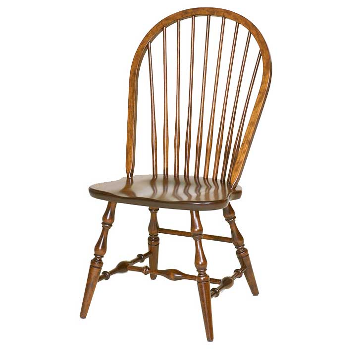A classic wooden spindle-back chair with a warm medium-brown finish, isolated on a white background.