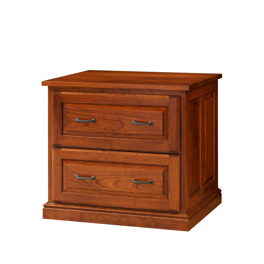 Two drawer lateral file cabinet in cherry with raised panel drawer fronts, bronze pulls and molded base