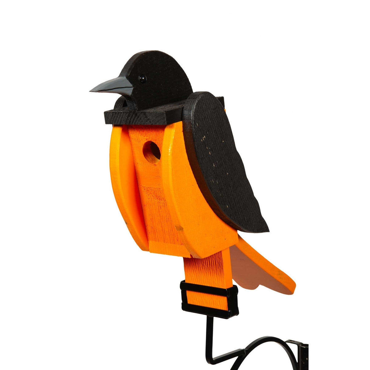 Orange and black oriole shaped birdhouse with round entry hole mounted on a black bracket