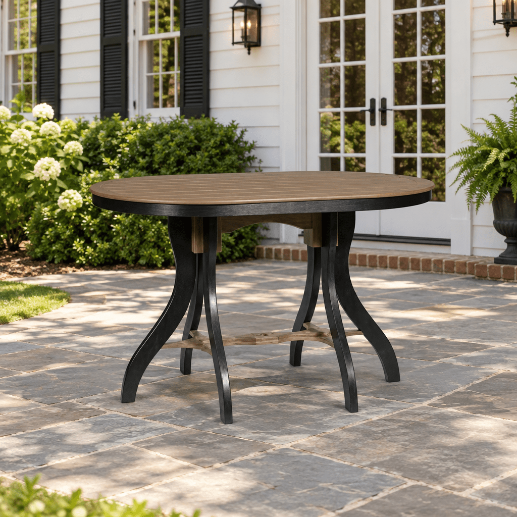 Amish Outdoor Oval Poly Dining Counter Bar Patio Table shown in the back patio of a traditional colonial home