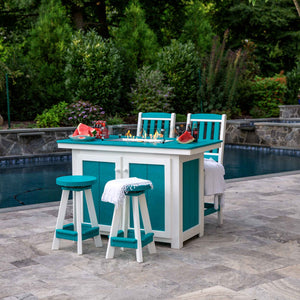 Aruba blue and white poly propane fire pit dining island with glass surround, two swivel stools and chairs by a pool