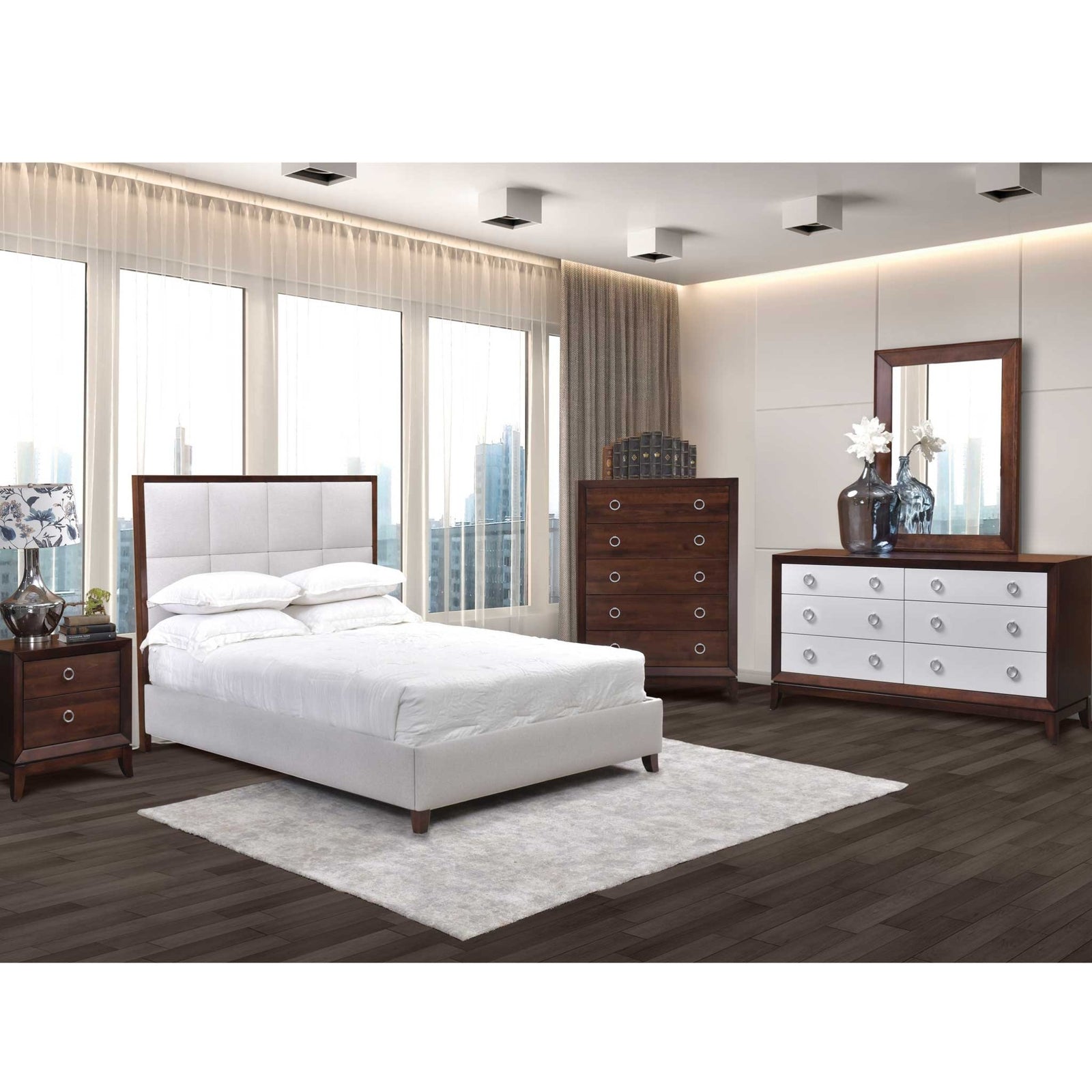 Modern high rise bedroom with white upholstered panel bed, five drawer chest, two tone dresser and mirror
