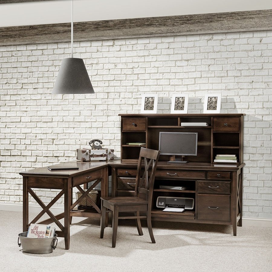 Home office corner setup with an X panel writing desk, credenza with hutch and matching side chair by white brick