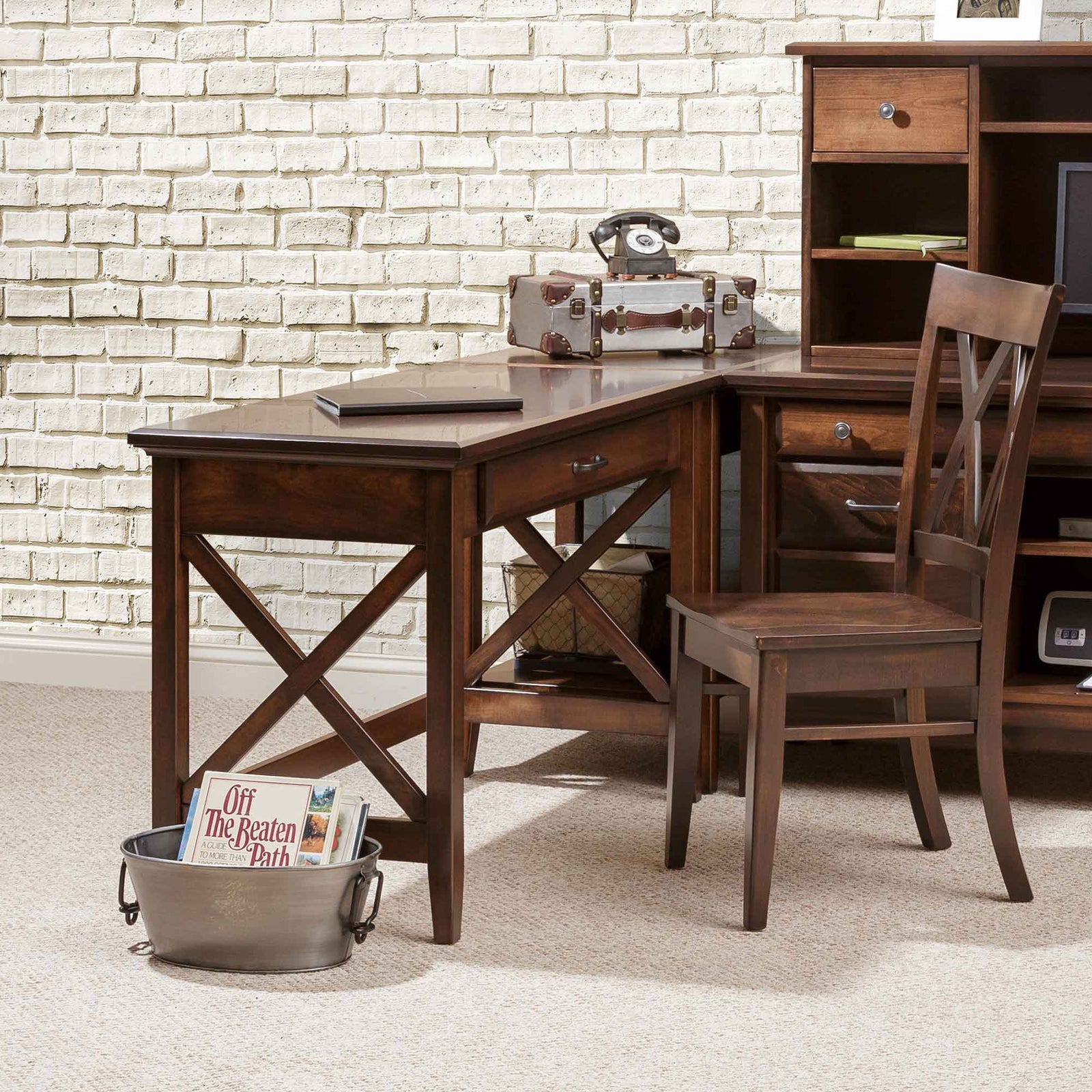 Corner table desk with a single drawer and X side panels, paired with a matching chair by white brick