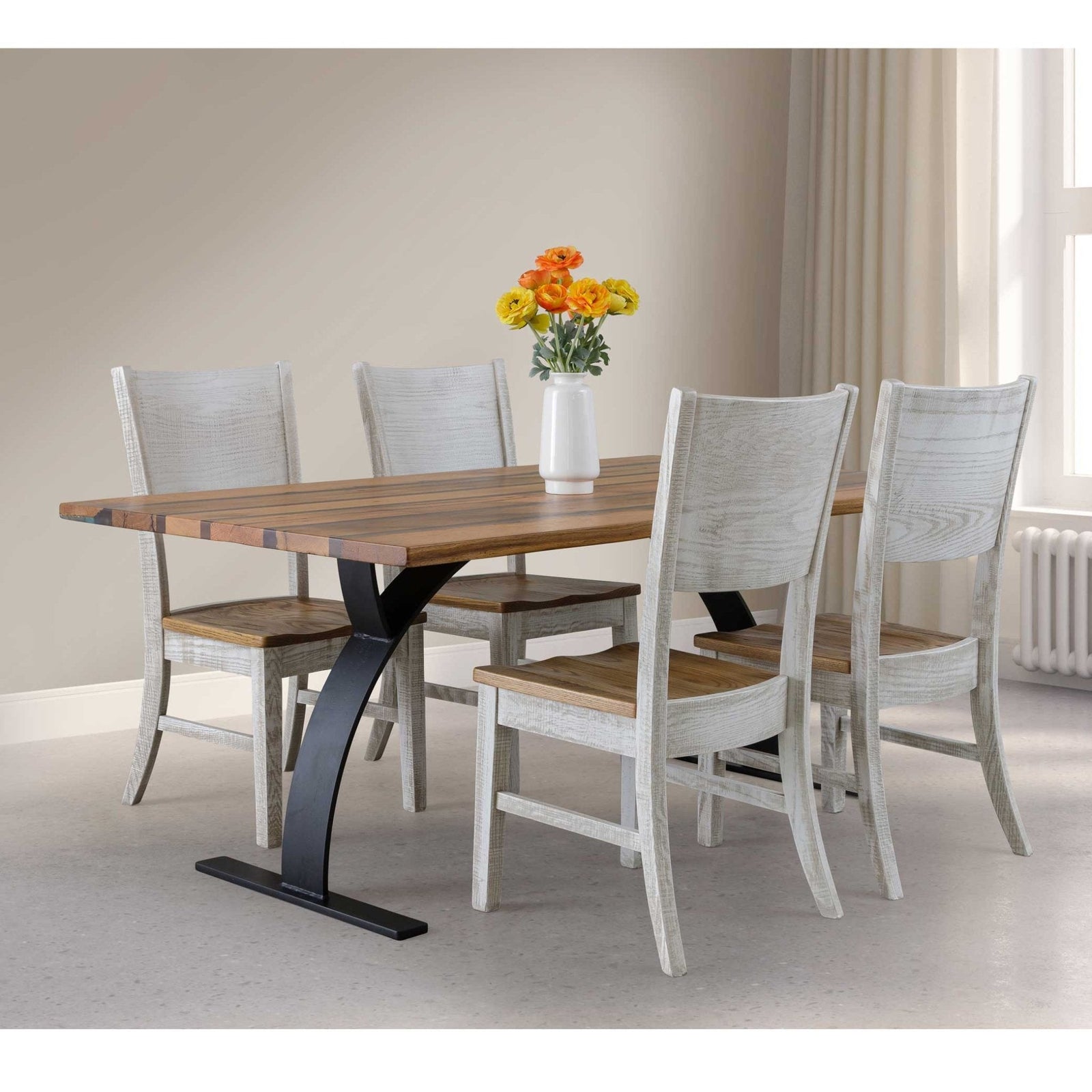Reclaimed wood dining set with a resin striped table top, curved black metal base and four white washed chairs