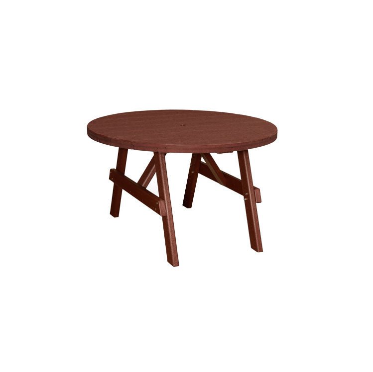 Round poly patio garden table for four with cream top and black frame, set with plates under a patio umbrella