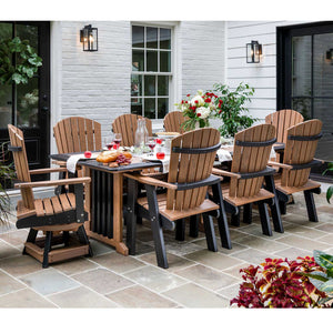 Cedar and black poly 96 inch bistro patio dining table with eight fan back chairs set for dinner on a bluestone patio