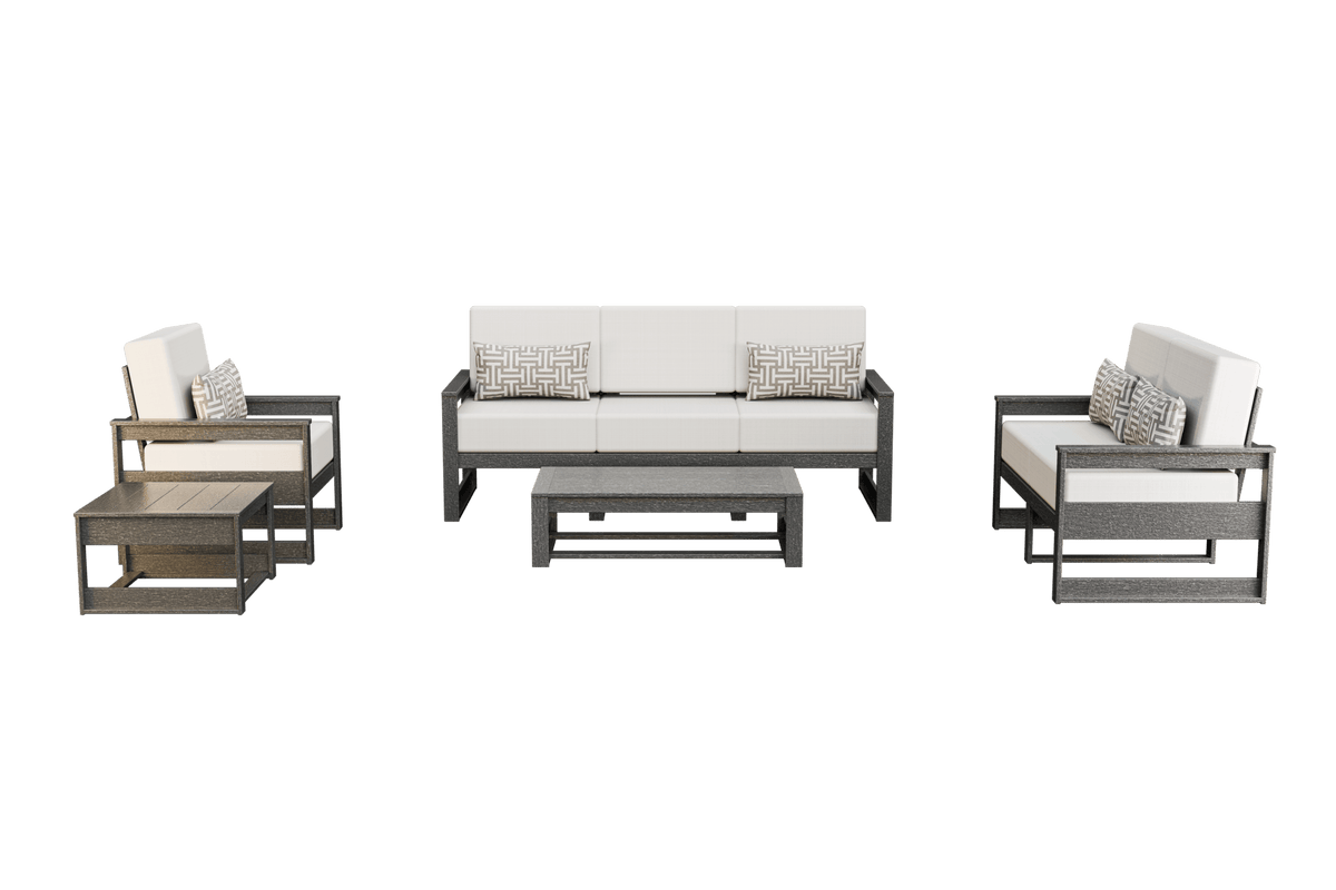 Gray frame poly patio set with crisp white cushions, woven pillows, coffee table and square side table