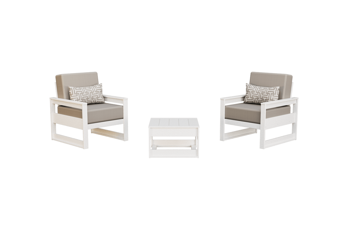 White framed poly patio chairs with mushroom gray cushions and pillows beside a matching side table
