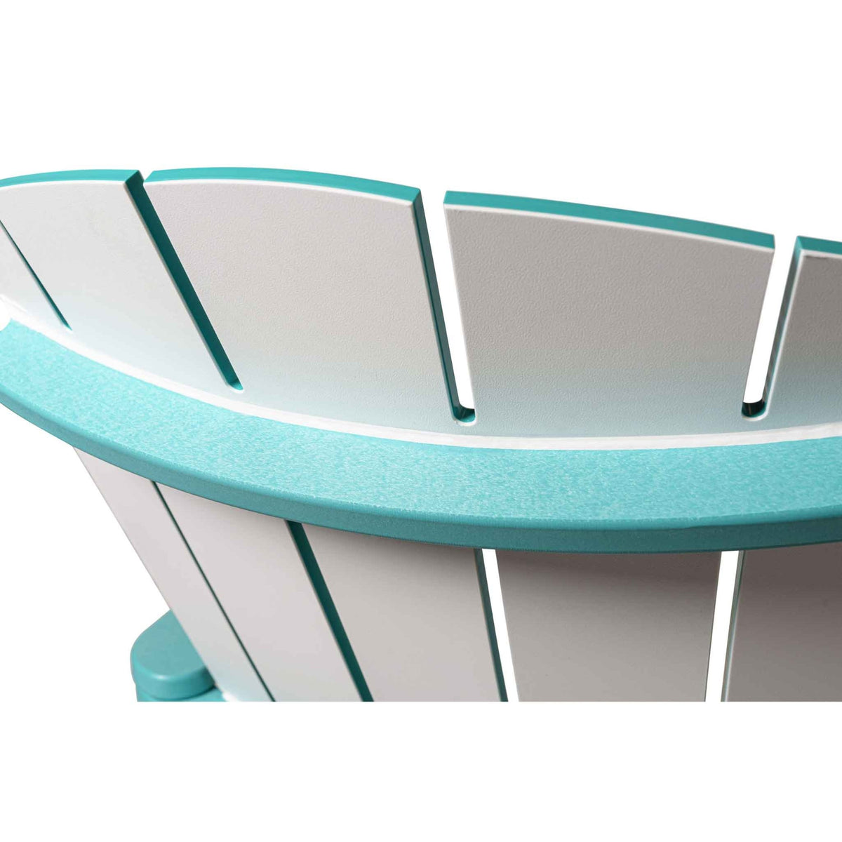 Detail of the fanned white back slats and aqua trimmed curved top rail on a poly Adirondack chair