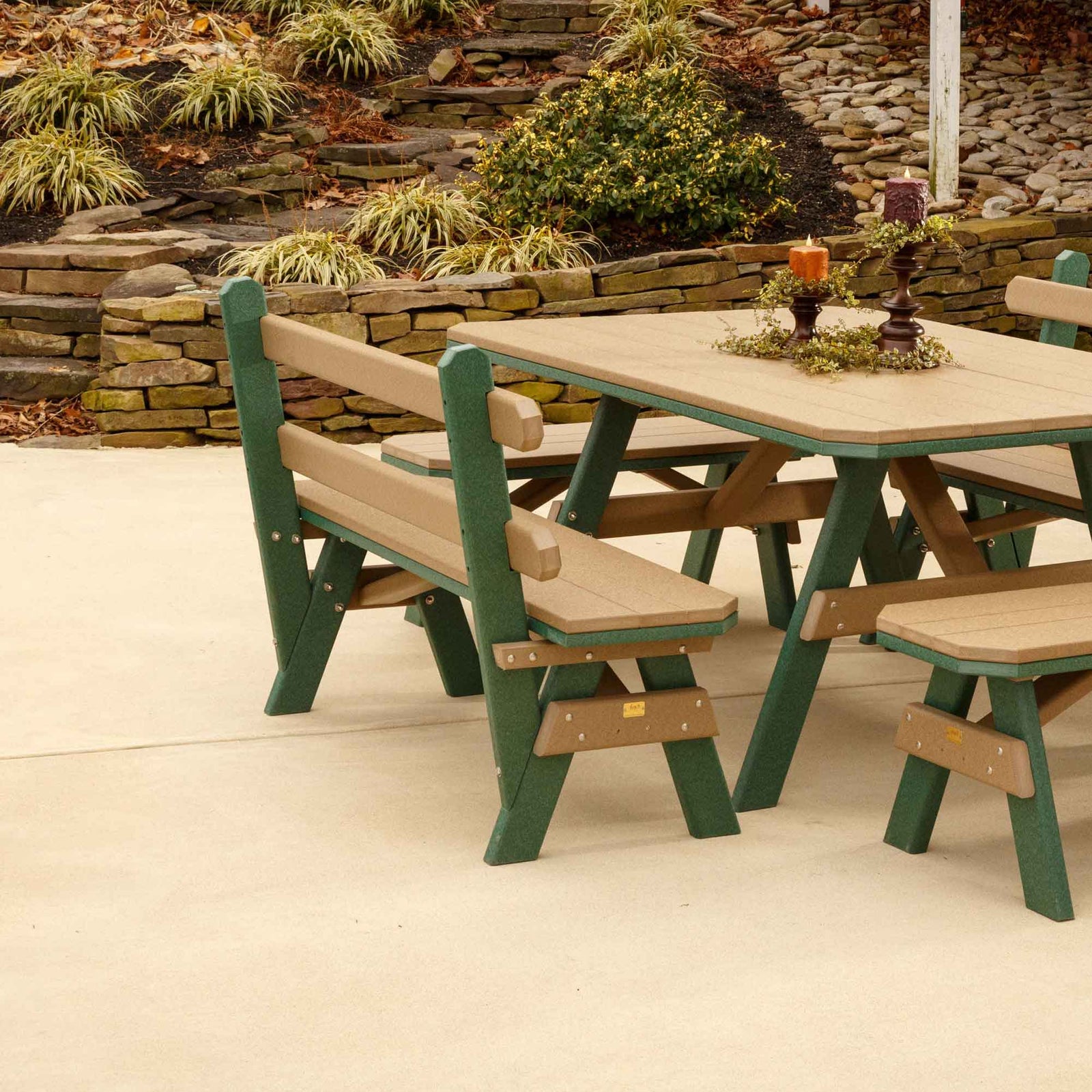 Weatherwood poly garden bench with a two rail back, plank seat and braced A frame legs on a white background