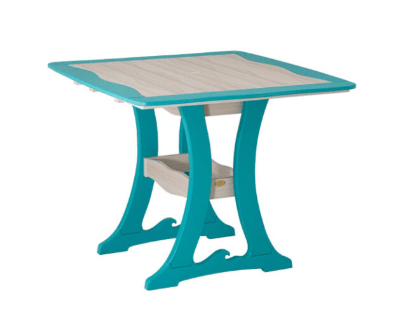 Square poly patio table with a wave-pattern sand and aruba blue top on curved turquoise trestle legs with a lower shelf