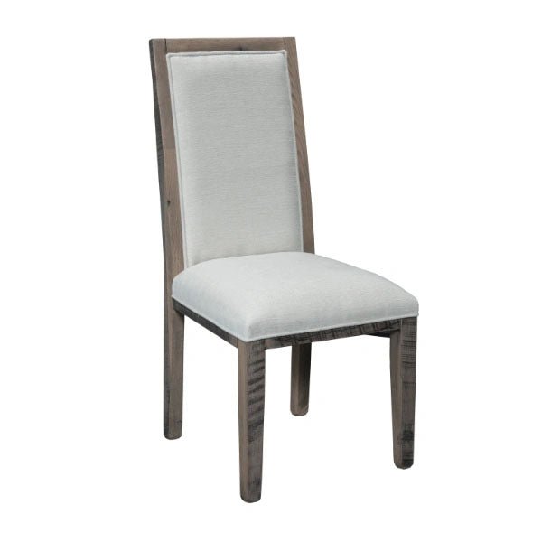 Upholstered dining arm chairs in taupe leather with reclaimed wood frames and black metal arm supports at a glass-top table