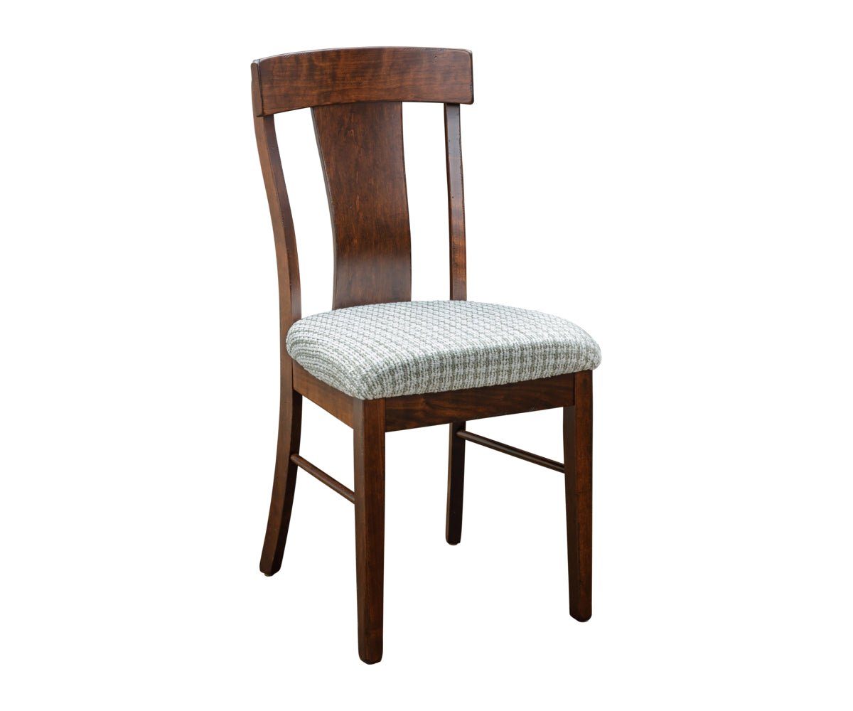Dining chair in dark cherry with a curved solid back splat and a green and cream patterned cushioned seat