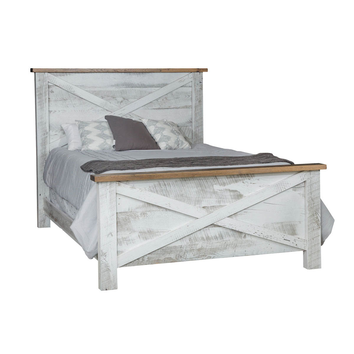 Coastal style bedroom set with a distressed white X-panel bed, natural wood top caps, nightstand and chest of drawers