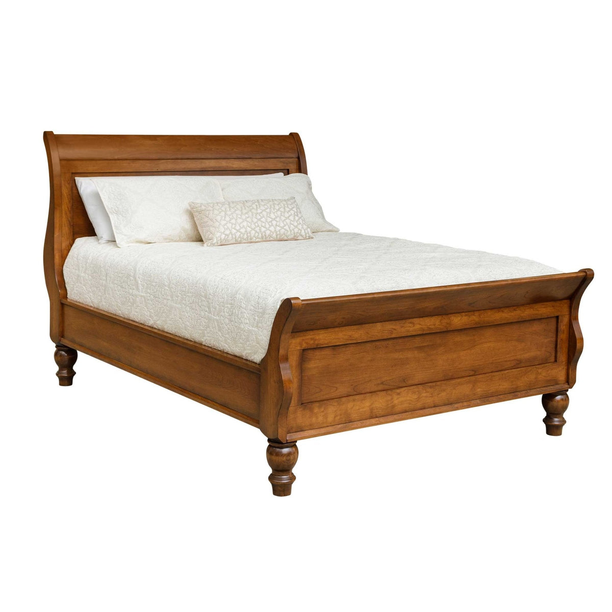Detail of a cherry sleigh bed footboard corner, rail bolt pocket and maple slat on the support cleat