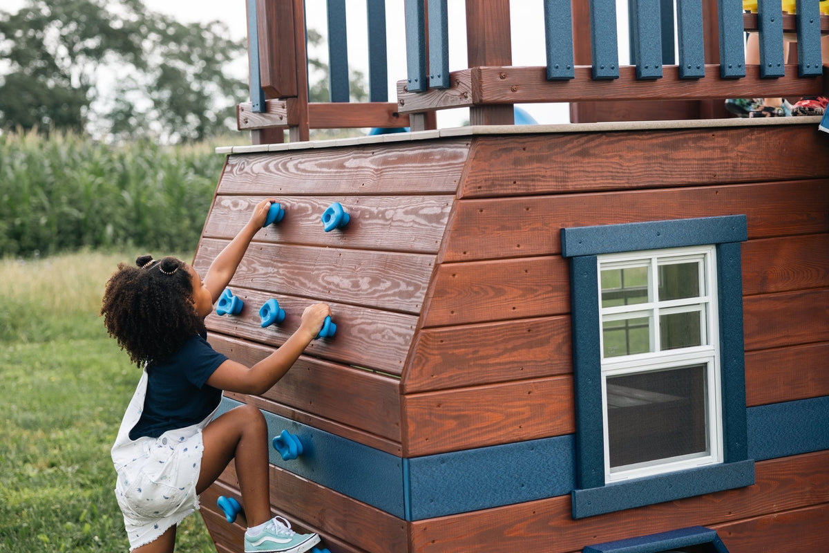 Scout Camper Wooden Swing Set & Playset Kit – real-world photo (configuration and colors may differ from the layouts offered)