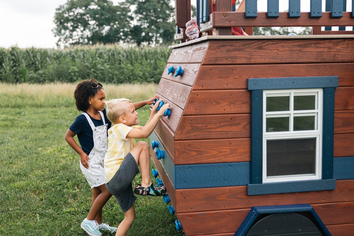 Scout Camper Wooden Swing Set & Playset Kit – real-world photo (configuration and colors may differ from the layouts offered)