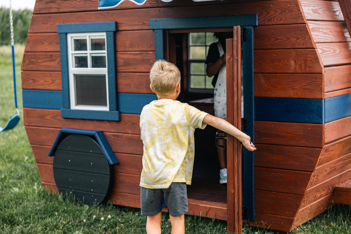 Scout Camper Wooden Swing Set & Playset Kit – real-world photo (configuration and colors may differ from the layouts offered)