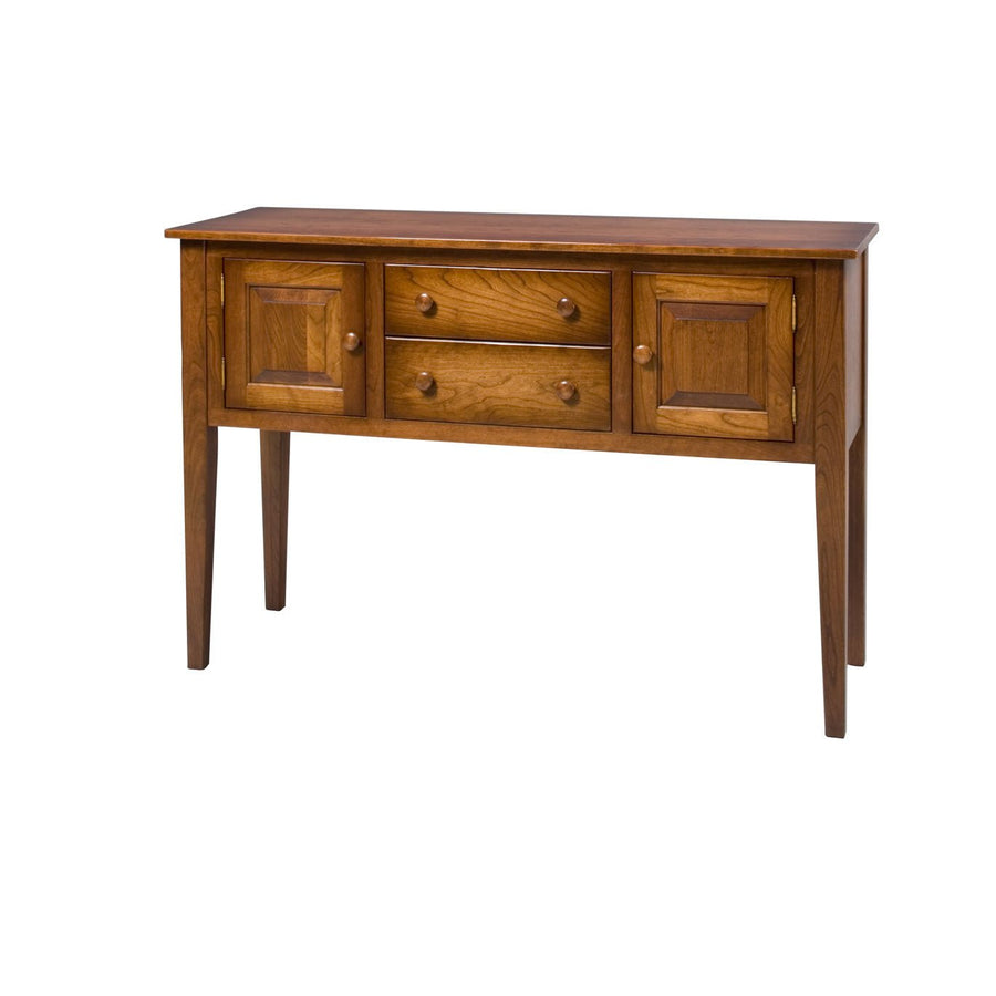 Cherry Shaker sideboard buffet with two raised panel doors flanking two center drawers on tall tapered legs, white background