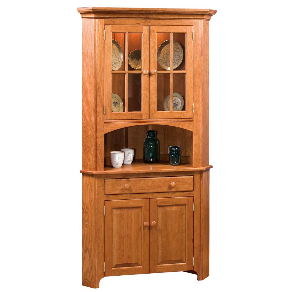 Shaker corner china cabinet in cherry with glass upper doors, arched open shelf, wide drawer and two raised panel base doors