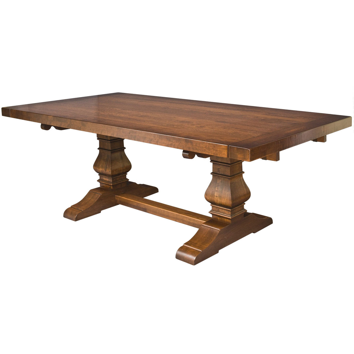 Rectangular expandable pedestal dining table in warm brown wood with two urn pedestals joined by a shaped trestle stretcher