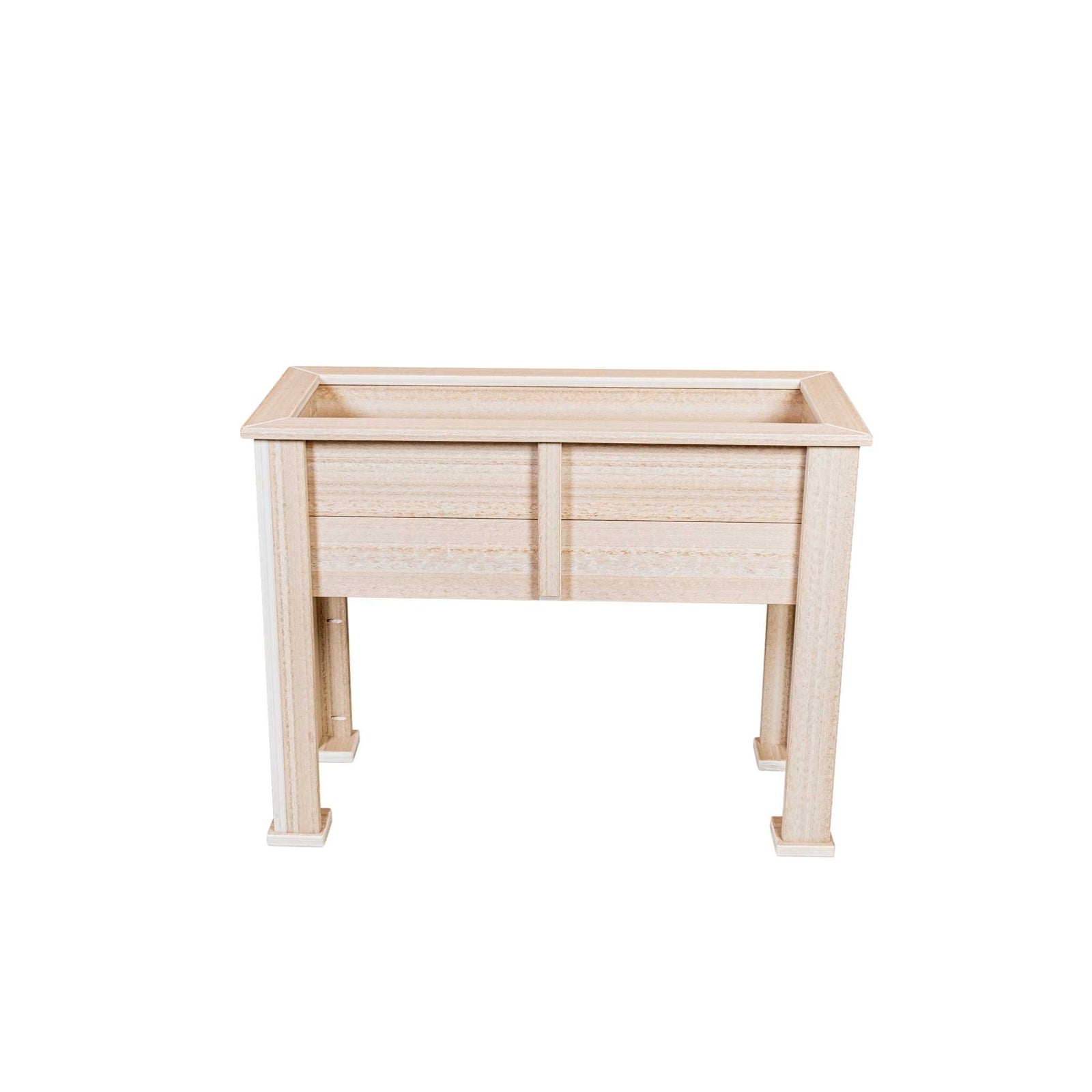 Raised birch poly planter on legs filled with large green leafy plants beside a pond railing