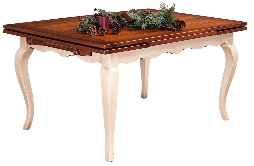 Two-tone draw leaf table with a cherry stained top, cream painted cabriole legs and pinecone greenery on top